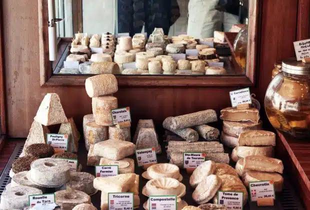 a bunch of different types of bread on a table